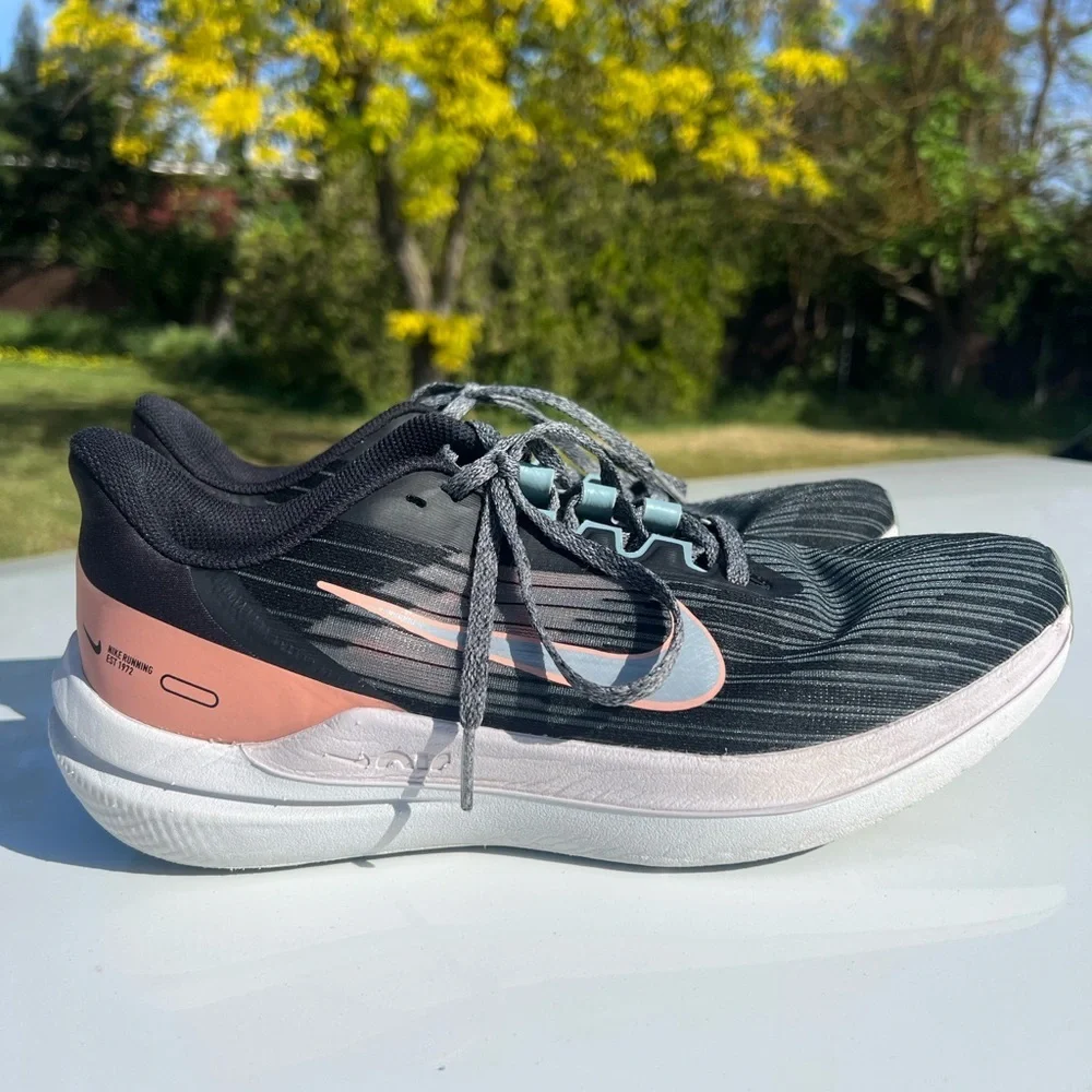 Nike Women’s Running Shoes — Black with Coral and Light Blue Accents